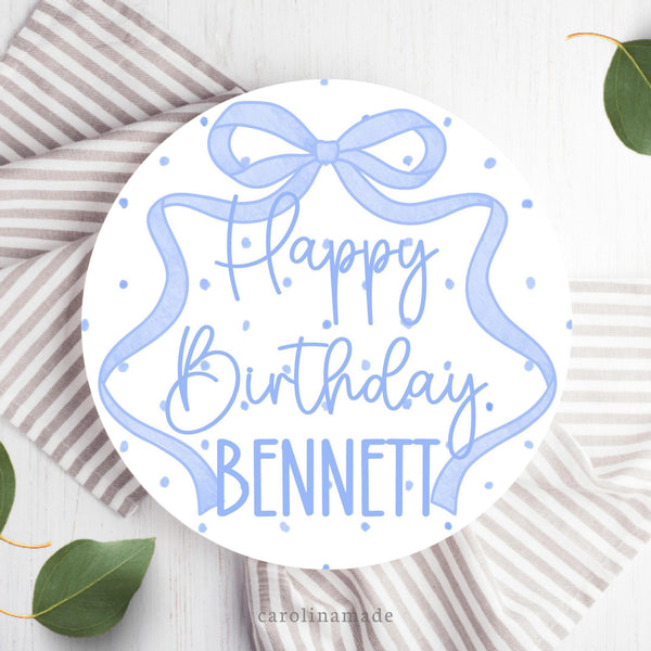 This ten inch plate features a blue poka dot plate with a long ribbon bow around the plate. It is personalized with your childs name.
