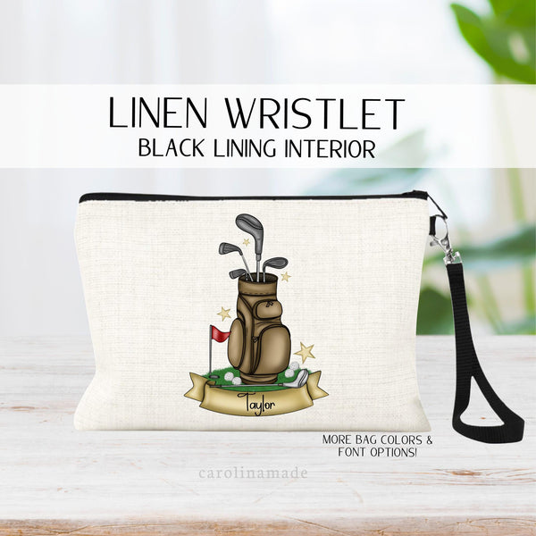 This linen makeup bag features a brown golf bag with clubs,balls and flag pole. Your name is in a ribbon personalized at the bottom.