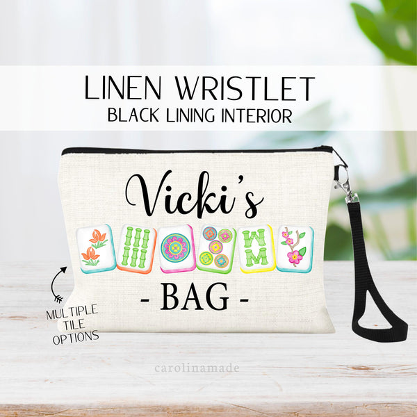 Personalized linen zipper pouch perfect for mahjong game night! This bag features your name and beautiful vibrant mah jongg tiles. Now offering multiple girly and mens mahjong set