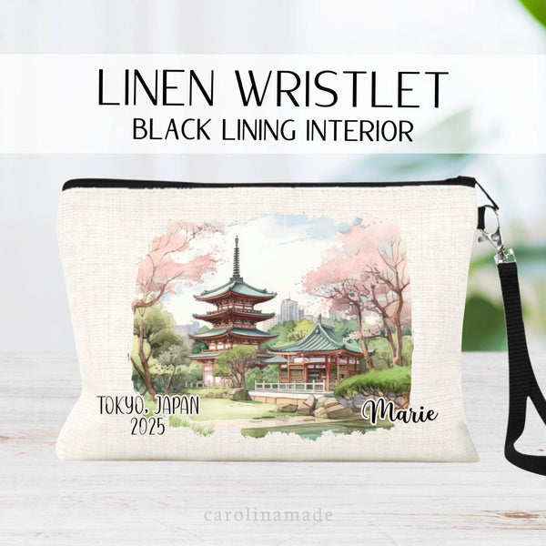Beautiful watercolor design of Tokyo Japan in the middle of this linen wristlet bag. It is personalized with your name on bottom right, with Tokyo Japan and the year on the bottom left.