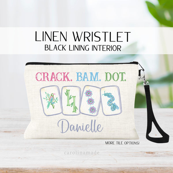 Personalized linen zipper pouch perfect for mahjong game night! This bag features four watercolor mah jongg tiles in the center. The top says Crack Bam Dot and the bottom has your custom name.