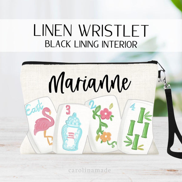 This beautiful linen zipper pouch features 4 cute and fun mahjong tiles across the bottom with your personalized name at the top.