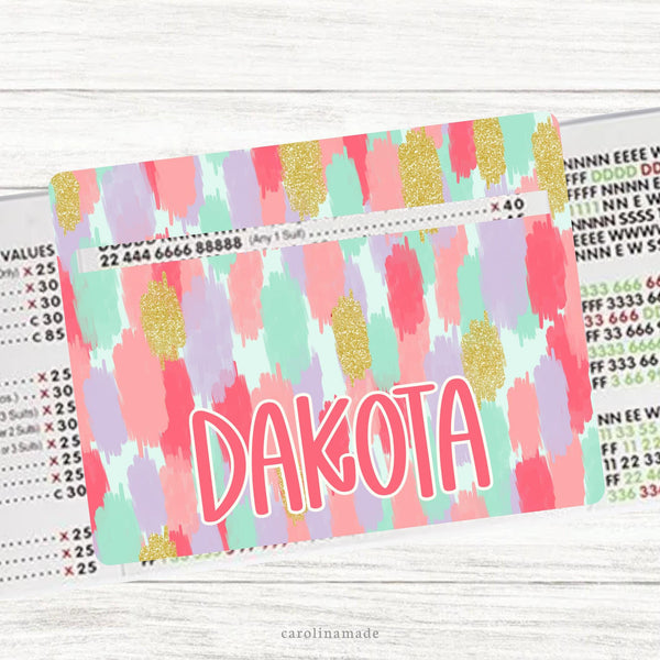 This acrylic mahjong line reader features a colorful brushstroke background with your personalized name in the center. Check out our mahjong zipper pouches to carry your line finder