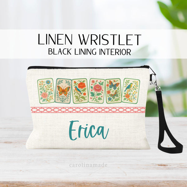 This linen zipper pouch features 6 floral butterfly vintage looking tiles and is personalized with your name.
