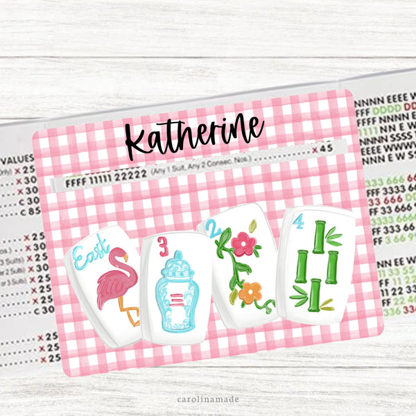 This acrylic mahjong line reader features a gingham background with four colorful mahjong tiles across the bottom. The top is personalization with your name. Matching zipper pouch available also.