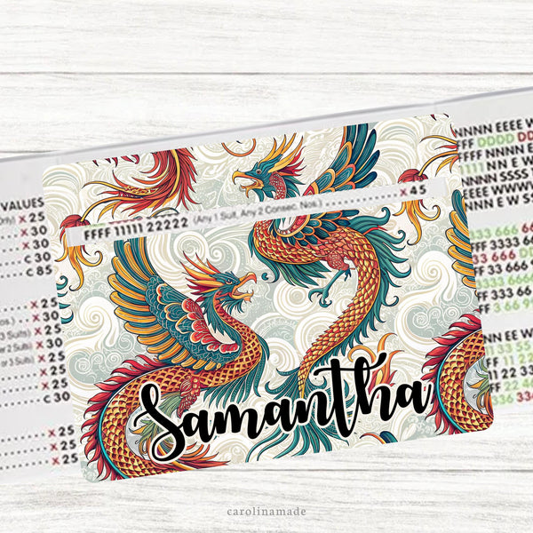This acrylic mahjong line reader features a cream background with colorful chinese dragons. The bottom is personalization with your name. Several mahj zipper pouchs available also.