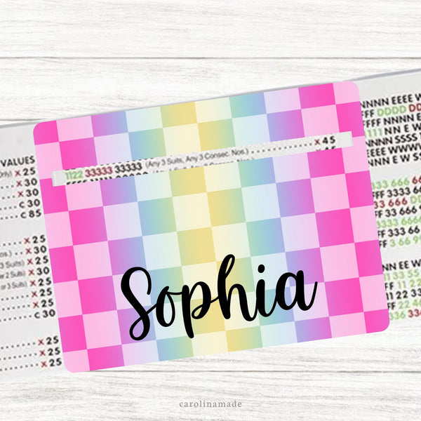 This acrylic mahjong line reader features a rainbow checkered background. The center is personalization with your name. Several mahjong zipper pouch available also.